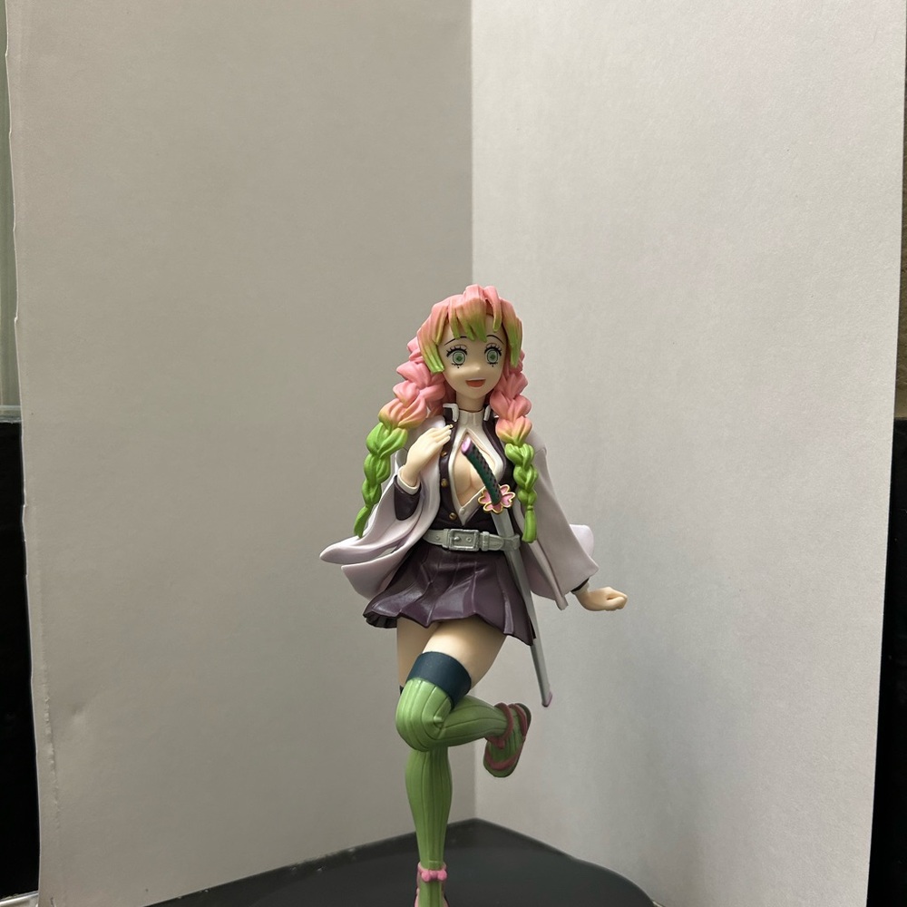 Anime Figure with Pink and Green Hair